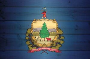 A wooden panel depiction of the Vermont state flag.